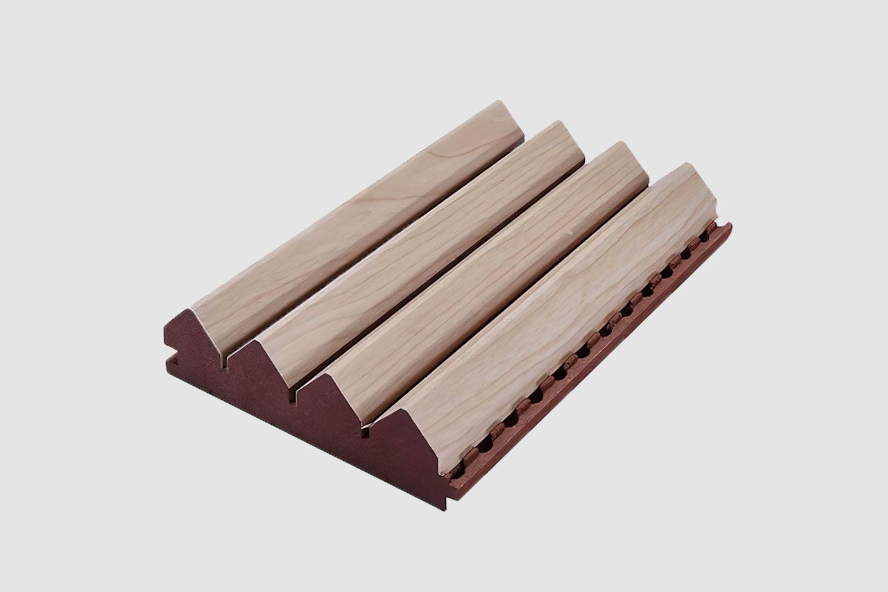 A wooden knife holder with three diagonal slots for holding knives, featuring a light wood top and a darker wood base reminiscent of Timberix Grooved Acoustic Panels, placed on a plain white background.
